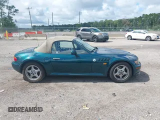 1999 BMW Z3 2.5 with VIN 4USCH9336XLF81090, listed as a IAAI auction lot 42742278 with 164,341 mi miles and . Bid and sale history available at DreamBid. Image 13.