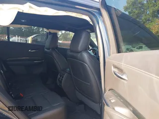 2020 Cadillac XT4 FWD Sport with VIN 1GYFZER40LF048628, listed as a IAAI auction lot 39985771 with 61,030 mi miles. Bid and sale history available at carsss.com. Image 8.