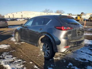 2023 Mazda CX-5 Signature with VIN JM3KFBXY8P0258573, listed as a Copart auction lot 42615075 with 18,916 mi miles and Salvage Title. Bid and sale history available at carsss.com. Image 2.