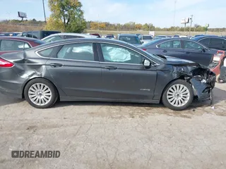 2015 Ford Fusion SE Hybrid with VIN 3FA6P0LUXFR266743, listed as a IAAI auction lot 40862039 with 116,610 mi miles. Bid and sale history available at carsss.com. Image 13.