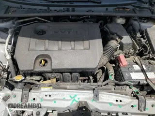 2014 Toyota Corolla L z VIN 2T1BURHE6EC049024, wystawiony jako Copart lot #63275365 z przebiegiem 145 828 mil mil oraz Szkoda całkowita • Salvage title. Historia ofert i sprzedaży dostępna na DreamBid. Obrazek 11.