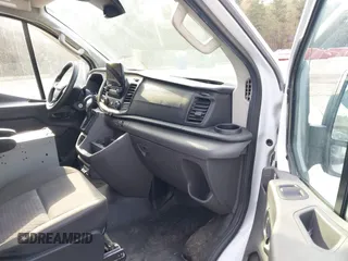 2020 Ford Transit Cargo with VIN 1FTBR1Y85LKA70004, listed as a IAAI auction lot 41910007 with 115,005 mi miles and . Bid and sale history available at DreamBid. Image 5.