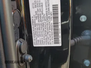 2023 Honda Passport Elite with VIN 5FNYF8H01PB030270, listed as a Copart auction lot 61402965 with 7,931 mi miles and Salvage title. Bid and sale history available at DreamBid. Image 14.