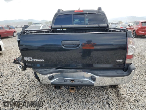 2014 Toyota Tacoma with VIN 3TMLU4EN8EM145918, listed as a Copart auction lot 60435105 with 121,046 mi miles and Salvage title. Bid and sale history available at DreamBid. Image 6.