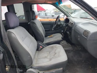 1995 Nissan Frontier SE with VIN 1N6HD16Y9SC458872, listed as a IAAI auction lot 41809314 with 184,016 mi miles and . Bid and sale history available at DreamBid. Image 5.