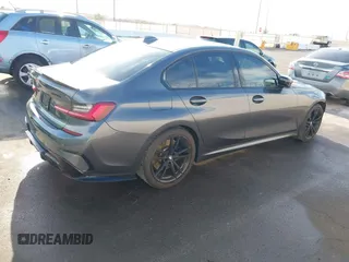2020 BMW 3 Series M340i with VIN WBA5U7C02LFJ02994, listed as a IAAI auction lot 41848165 with 59,220 mi miles. Bid and sale history available at carsss.com. Image 4.