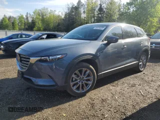2023 Mazda CX-9 Touring z VIN JM3TCBCYXP0650893, wystawiony jako Copart lot #56875635 z przebiegiem 30 055 mil mil oraz Czysty tytuł • Clean title. Historia ofert i sprzedaży dostępna na DreamBid. Obrazek 1.