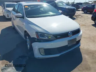 2014 Volkswagen Jetta GLI Edition 30 z VIN 3VW4S7AJ3EM278162, wystawiony jako IAAI lot #41649711 z przebiegiem 136 402 mil mil oraz . Historia ofert i sprzedaży dostępna na DreamBid. Obrazek 6.