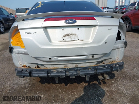 2010 Ford Fusion SE z VIN 3FAHP0HA8AR350320, wystawiony jako IAAI lot #42431622 z przebiegiem 245 719 mil mil oraz . Historia ofert i sprzedaży dostępna na DreamBid. Obrazek 12.