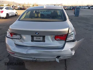 2013 BMW 3 Series 320i with VIN WBA3B1C53DK129703, listed as a IAAI auction lot 41295234 with 175,506 mi miles. Bid and sale history available at carsss.com. Image 6.