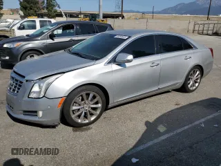 2014 Cadillac XTS Luxury z VIN 2G61M5S38E9150015, wystawiony jako Copart lot #59358005 z przebiegiem 136 193 mil mil oraz Szkoda całkowita • Salvage title. Historia ofert i sprzedaży dostępna na DreamBid. Obrazek 1.