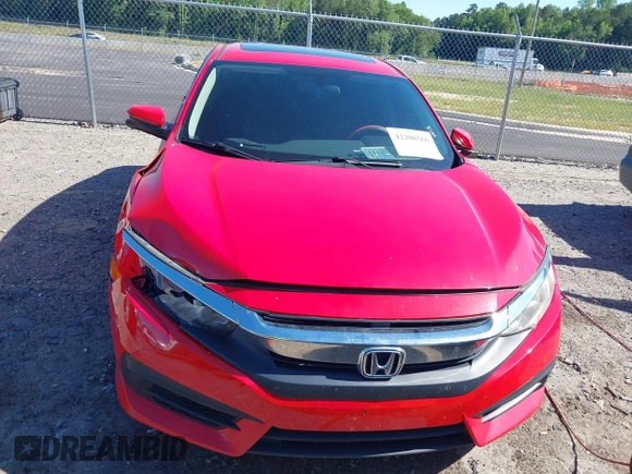2017 Honda Civic EX z VIN 2HGFC2F77HH535613, wystawiony jako IAAI lot #42208566 z przebiegiem 121 024 mil mil oraz . Historia ofert i sprzedaży dostępna na DreamBid. Obrazek 12.
