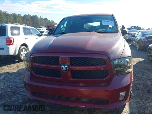 2014 Ram 1500 Tradesman z VIN 1C6RR7FT4ES171215, wystawiony jako IAAI lot #41293240 z przebiegiem 115 967 mil mil oraz . Historia ofert i sprzedaży dostępna na DreamBid. Obrazek 13.