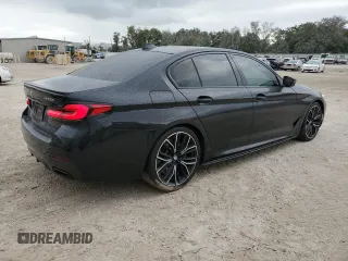 2022 BMW 5 Series M550i xDrive z VIN WBA13BK02NCH74485, wystawiony jako Copart lot #78734134 z przebiegiem 35 332 mil mil oraz Szkoda całkowita • Salvage title. Historia ofert i sprzedaży dostępna na DreamBid. Obrazek 3.