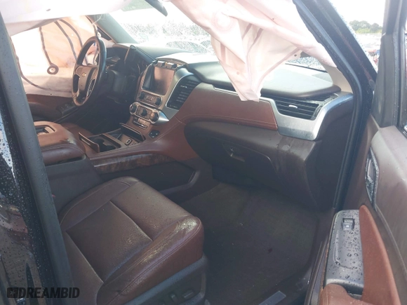 2018 Chevrolet Suburban Premier with VIN 1GNSCJKC2JR199702, listed as a IAAI auction lot 41136128 with 80,103 mi miles. Bid and sale history available at carsss.com. Image 5.