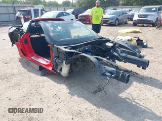 2015 Chevrolet Corvette Z06 2LZ z VIN 1G1YR2D69F5600121, wystawiony jako IAAI lot #42321716 z przebiegiem Nie podano mil oraz . Historia ofert i sprzedaży dostępna na DreamBid. Obrazek 1.