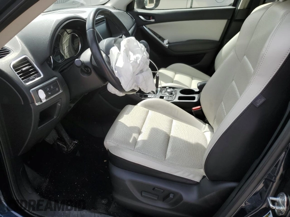 2016 Mazda CX-5 Grand Touring with VIN JM3KE4DYXG0844002, listed as a Copart auction lot 52712035 with 81,042 mi miles and Salvage Title. Bid and sale history available at DreamBid. Image 7.