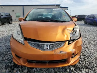 2011 Honda Fit Sport with VIN JHMGE8H59BC007883, listed as a Copart auction lot 54194635 with 123,256 mi miles and Salvage Title. Bid and sale history available at DreamBid. Image 5.