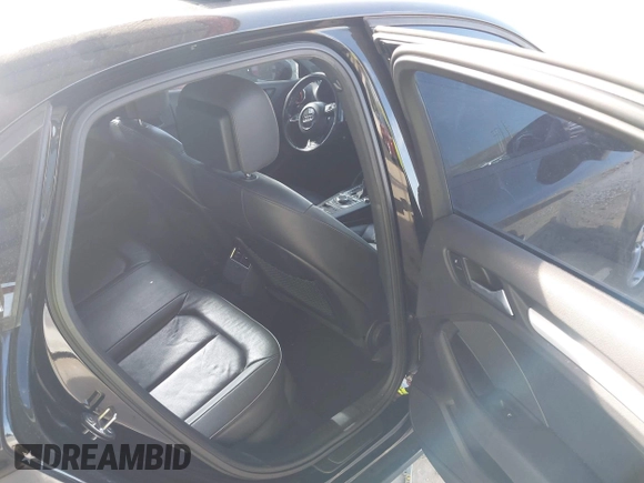 2015 Audi A3 Premium z VIN WAUACGFF1F1140560, wystawiony jako IAAI lot #42151740 z przebiegiem 118 664 mil mil oraz . Historia ofert i sprzedaży dostępna na DreamBid. Obrazek 8.