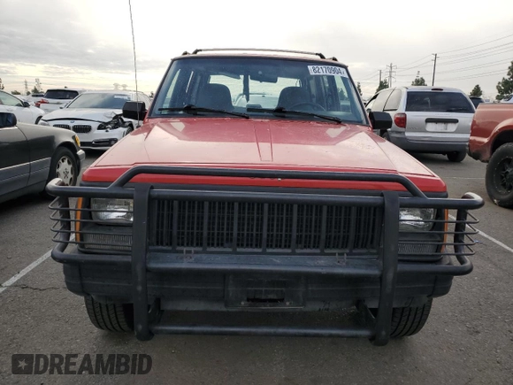 1996 Jeep Cherokee Sport with VIN 1J4FT68S8TL232241, listed as a Copart auction lot 82170904 with 287,125 mi miles and Salvage Title. Bid and sale history available at carsss.com. Image 5.