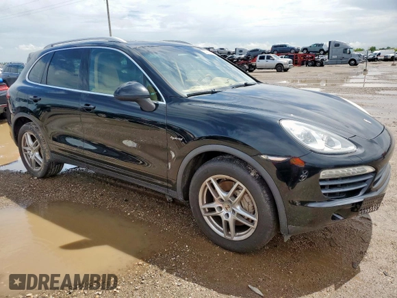 2013 Porsche Cayenne S Hybrid с VIN WP1AE2A20DLA14095, выставлен на аукционе Copart как лот 64215625 с пробегом 148 286 миль миль и Списание • Salvage title. История ставок и продаж доступна на DreamBid. Изображение 4.