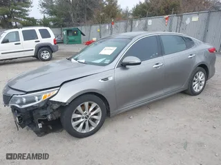 2016 Kia Optima EX with VIN 5XXGU4L33GG108511, listed as a IAAI auction lot 41355565 with 167,111 mi miles. Bid and sale history available at carsss.com. Image 17.