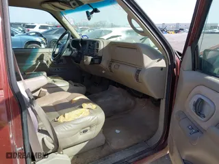 1999 Chevrolet Tahoe with VIN 1GNEC13R9XJ341261, listed as a IAAI auction lot 41741710 with 234,676 mi miles. Bid and sale history available at carsss.com. Image 5.