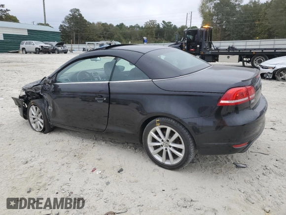 2015 Volkswagen Eos Komfort with VIN WVWBW8AH6FV005693, listed as a Copart auction lot 79176614 with 106,556 mi miles and Salvage Title. Bid and sale history available at DreamBid. Image 2.