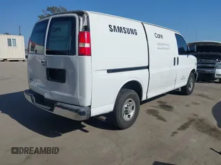2016 Chevrolet Express Cargo Van with VIN 1GCWGAFF0G1323959, listed as a IAAI auction lot 42172260 with 211,384 mi miles. Bid and sale history available at carsss.com. Image 4.