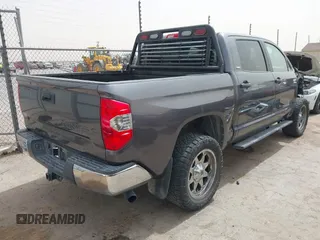2014 Toyota Tundra SR5 z VIN 5TFEM5F1XEX082020, wystawiony jako IAAI lot #41914391 z przebiegiem 75 787 mil mil oraz . Historia ofert i sprzedaży dostępna na DreamBid. Obrazek 4.