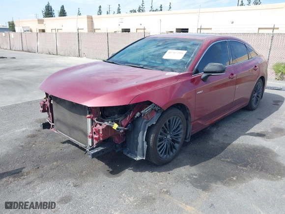 2019 Toyota Avalon Hybrid Limited with VIN 4T1B21FB4KU009762, listed as a IAAI auction lot 41707299 with 156,143 mi miles. Bid and sale history available at carsss.com. Image 2.