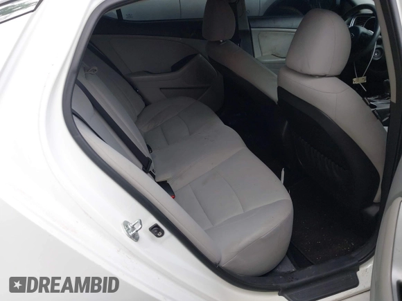 2015 Kia Optima LX with VIN KNAGM4A7XF5599309, listed as a IAAI auction lot 42493215 with 143,703 mi miles and . Bid and sale history available at DreamBid. Image 8.