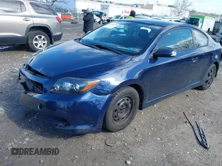 2008 Scion tC Spec with VIN JTKDE167180236688, listed as a IAAI auction lot 41757178 with 131,953 mi miles. Bid and sale history available at carsss.com. Image 2.