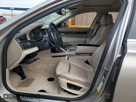 2012 BMW 7 Series 750Li with VIN WBAKB8C51CC962834, listed as a Copart auction lot 56592645 with 72,665 mi miles and Salvage title. Bid and sale history available at DreamBid. Image 7.