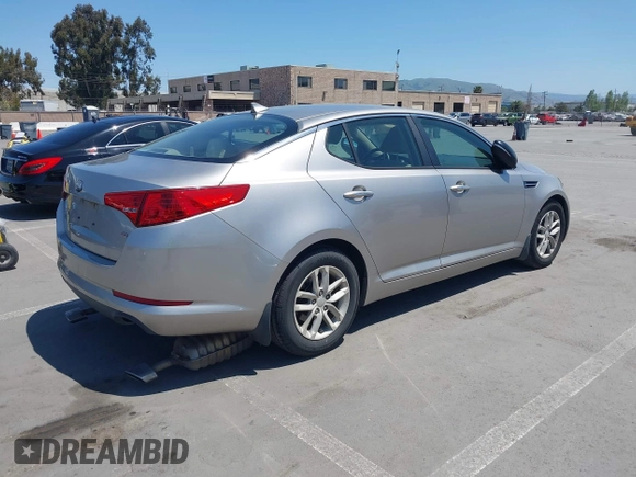 2013 Kia Optima LX with VIN KNAGM4A72D5399117, listed as a IAAI auction lot 42174312 with 105,661 mi miles and . Bid and sale history available at carsss.com. Image 4.