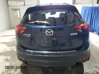 2016 Mazda CX-5 Grand Touring with VIN JM3KE4DY9G0708024, listed as a Copart auction lot 44689995 with 113,002 mi miles and Salvage Title. Bid and sale history available at DreamBid. Image 6.