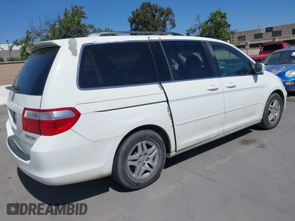 2005 Honda Odyssey EX-L with VIN 5FNRL38605B045246, listed as a IAAI auction lot 42183883 with 164,072 mi miles and . Bid and sale history available at carsss.com. Image 4.