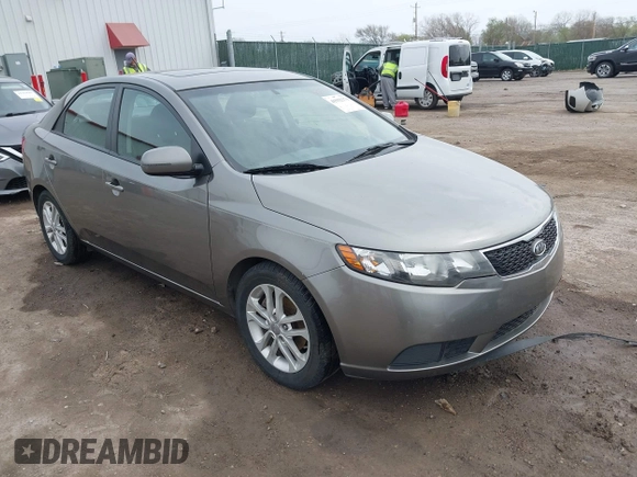 2012 Kia Forte EX with VIN KNAFU4A24C5632655, listed as a IAAI auction lot 41932379 with 146,273 mi miles. Bid and sale history available at carsss.com. Image 1.