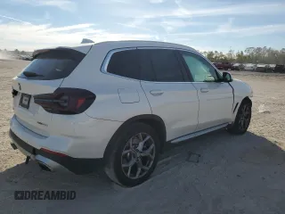 2022 BMW X3 xDrive30i with VIN 5UX53DP07N9M13593, listed as a Copart auction lot 82590314 with Not Provided miles and Salvage Title. Bid and sale history available at DreamBid. Image 3.
