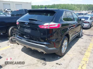 2021 Ford Edge Titanium z VIN 2FMPK3K96MBA16046, wystawiony jako IAAI lot #42137419 z przebiegiem 88 622 mil mil oraz . Historia ofert i sprzedaży dostępna na DreamBid. Obrazek 4.