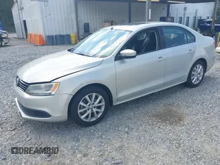 2011 Volkswagen Jetta Sedan SE w/Convenience & Sunroof PZEV with VIN 3VWDZ7AJ9BM360775, listed as a IAAI auction lot 42134100 with 183,012 mi miles. Bid and sale history available at carsss.com. Image 2.