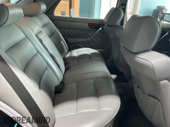 1991 Mercedes-Benz 300 with VIN WDBCA24E7MA571320, listed as a Copart auction lot 56029655 with 89,556 mi miles and Clean Title. Bid and sale history available at DreamBid. Image 6.