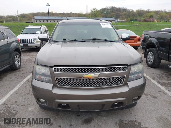 2011 Chevrolet Suburban LTZ with VIN 1GNSKKE32BR197356, listed as a IAAI auction lot 42052377 with 248,574 mi miles and . Bid and sale history available at DreamBid. Image 12.