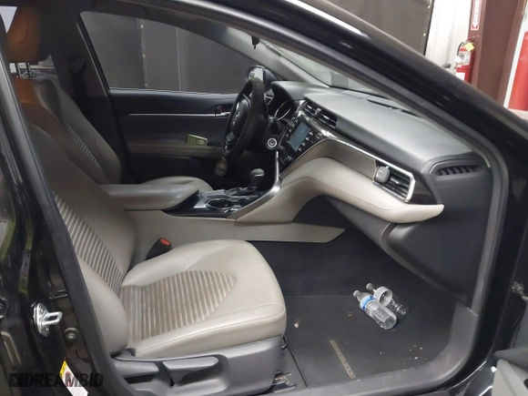 2018 Toyota Camry LE with VIN JTNB11HKXJ3048974, listed as a IAAI auction lot 41879941 with 102,377 mi miles. Bid and sale history available at carsss.com. Image 5.