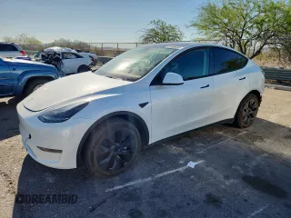 2024 Tesla Model Y z VIN 7SAYGDED7RF130909, wystawiony jako Copart lot #61096485 z przebiegiem 4 309 mil mil oraz Szkoda całkowita • Salvage title. Historia ofert i sprzedaży dostępna na DreamBid. Obrazek 1.