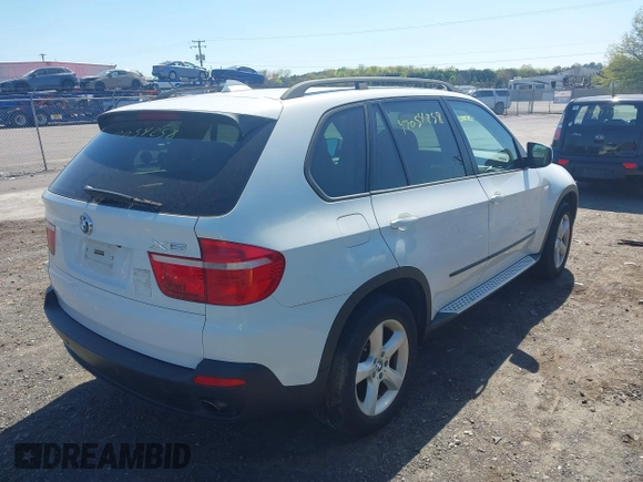 2008 BMW X5 3.0si with VIN 5UXFE43568L003293, listed as a IAAI auction lot 42054258 with 218,524 mi miles. Bid and sale history available at carsss.com. Image 4.