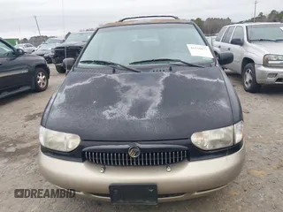 2000 Mercury Villager z VIN 4M2XV14T9YDJ16113, wystawiony jako IAAI lot #41516671 z przebiegiem 232 044 mil mil oraz . Historia ofert i sprzedaży dostępna na DreamBid. Obrazek 6.