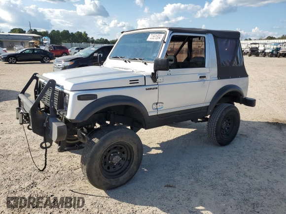 1987 Suzuki Samurai z VIN JS3JC51C3H4186141, wystawiony jako Copart lot #72551804 z przebiegiem 525 030 mil mil oraz Szkoda całkowita • Salvage title. Historia ofert i sprzedaży dostępna na DreamBid. Obrazek 1.