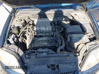 2003 Hyundai Tiburon GT z VIN KMHHN65FX3U076547, wystawiony jako IAAI lot #42015723 z przebiegiem 174 909 mil mil oraz . Historia ofert i sprzedaży dostępna na DreamBid. Obrazek 10.