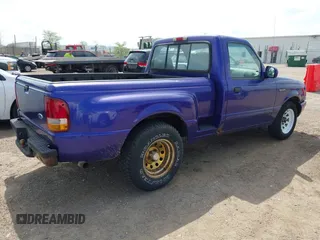 1997 Ford Ranger XLT with VIN 1FTCR10X1VPB20300, listed as a IAAI auction lot 42149506 with 153,656 mi miles. Bid and sale history available at carsss.com. Image 4.